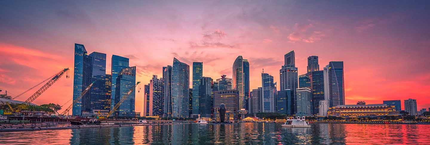 Singapore skyline and view of business district downtown with wooden walkway