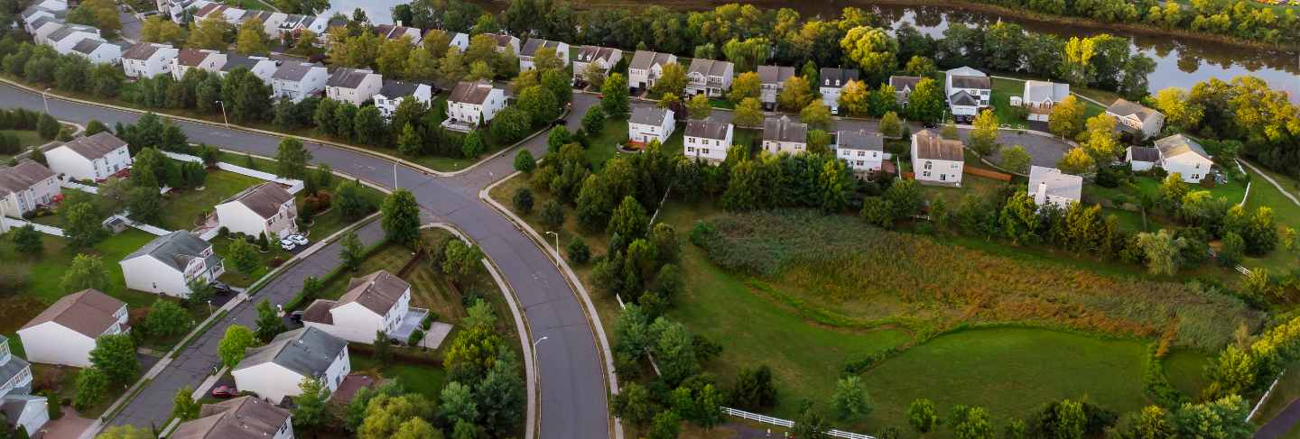 Wide panorama, aerial view with tall buildings, residential quarters in the beautiful sunrise