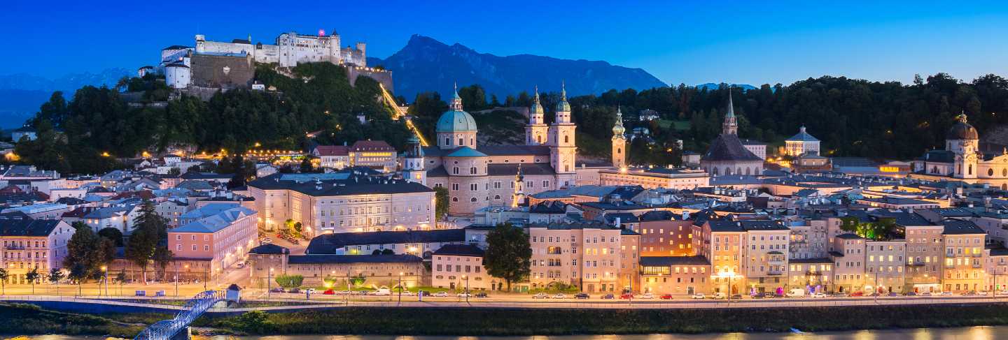 Salzburg cathedral and old castle in center of old town at sunset time in salzburg, austria
