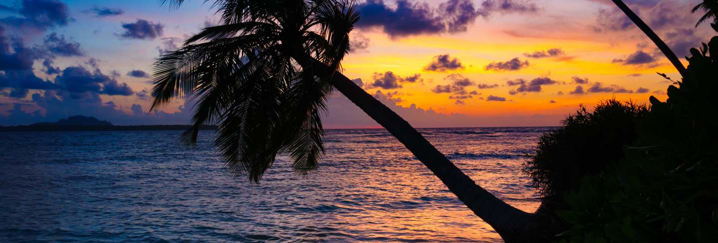 Sunrise dramatic sky on sea, tropical desert beach
