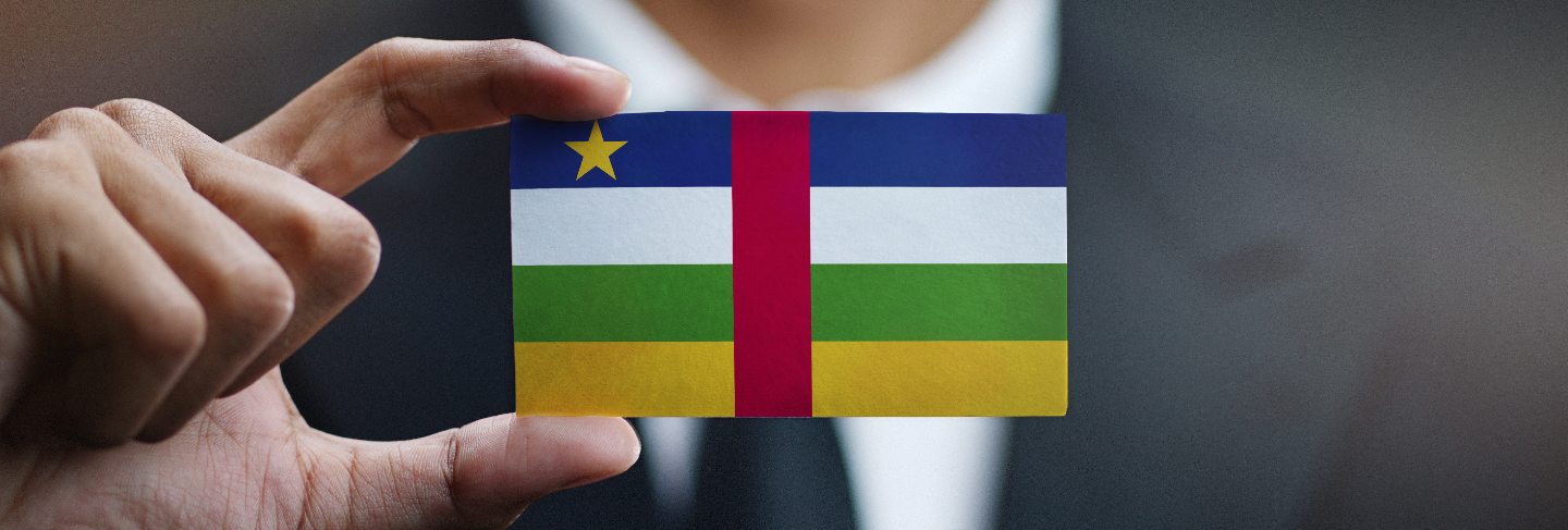 Businessman holding card of central african republic flag