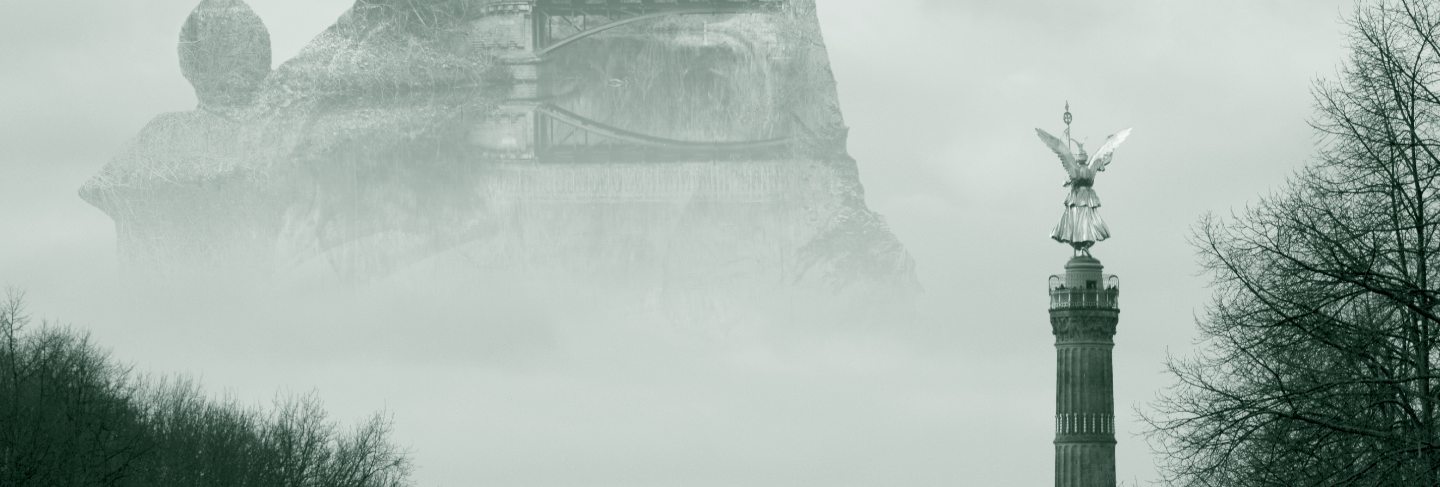 Beautiful shot of a large stone monument surrounded by fog
