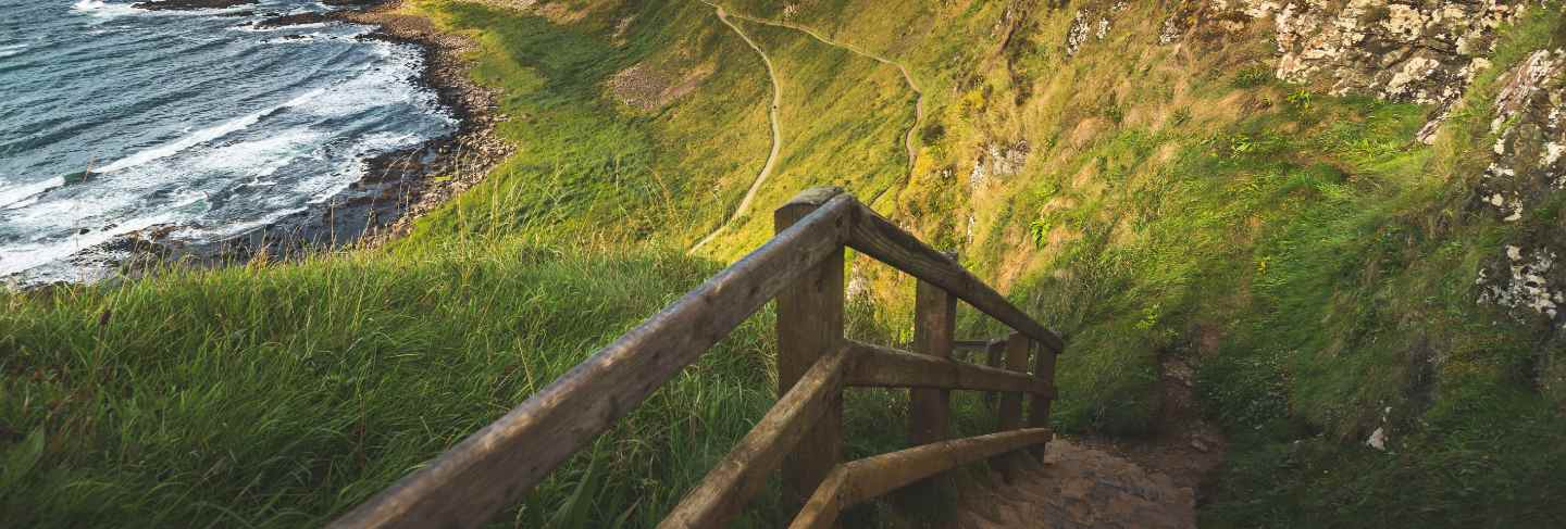 Rock stairs leading to the shore. northern ireland
