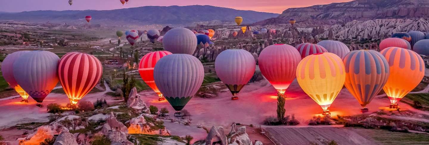 Colorful hot air balloons before launch in goreme national park, cappadocia, turkey