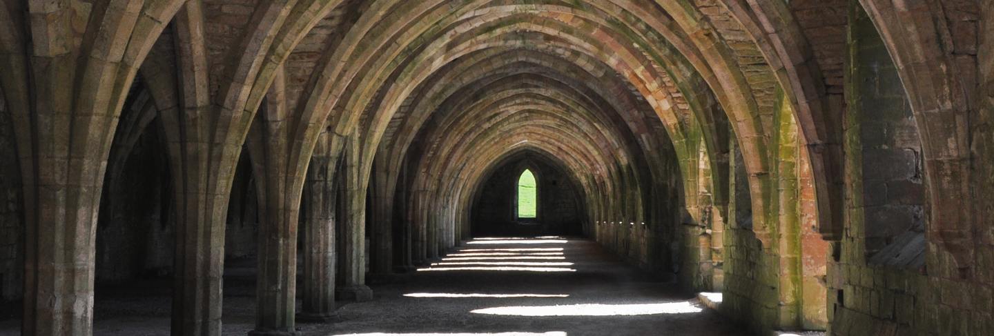 Vertical shot of a cellar in fountains abbey, yorkshire, england