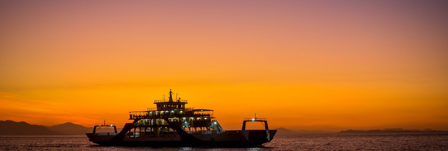 Ferry with sunset in puntarenas costa rica.
