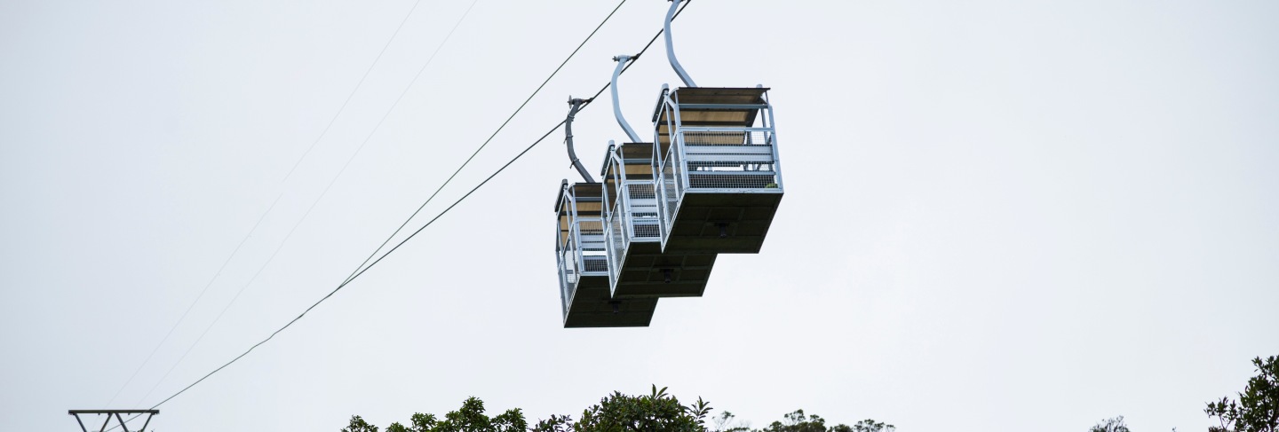 Three empty cable car over rainforest at costa rica
