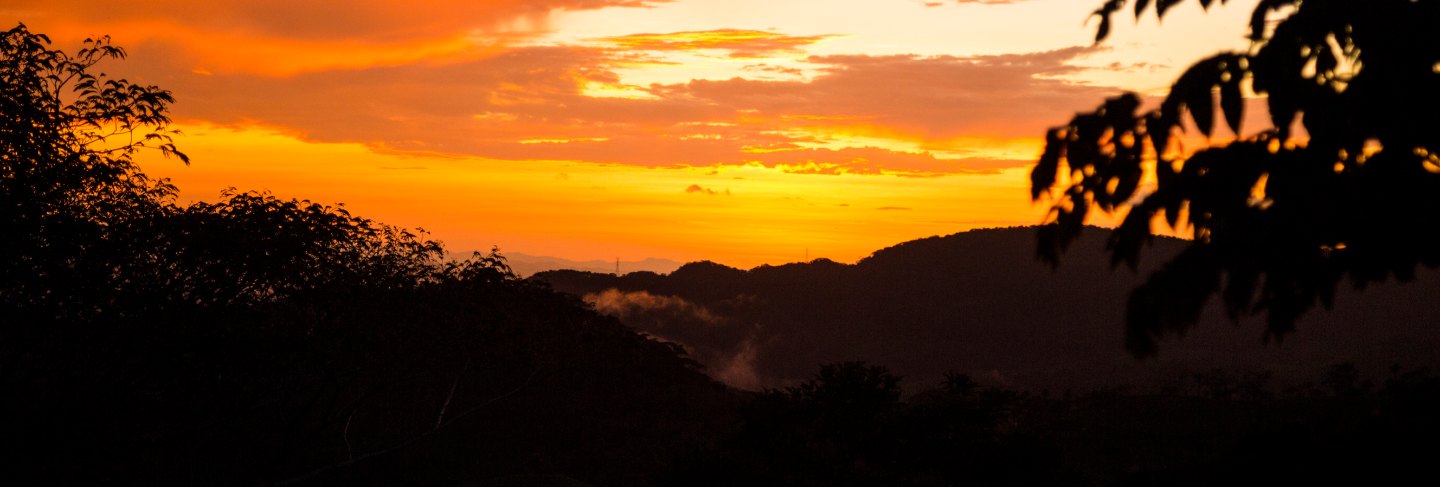 Colorful sunset over the mountain hills
