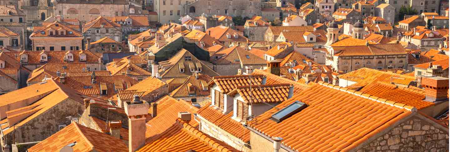 View of dubrovnik red roofs in croatia at sunset light
