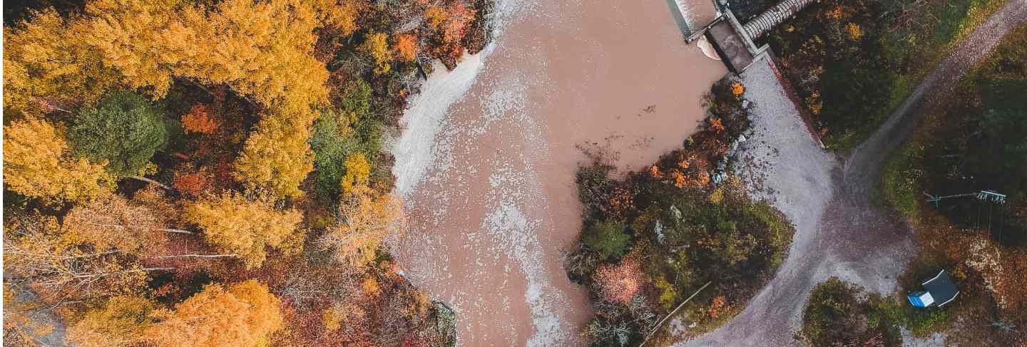 Aerial view of waterfall and river rapids. photo taken from a drone. finland, pornainen
