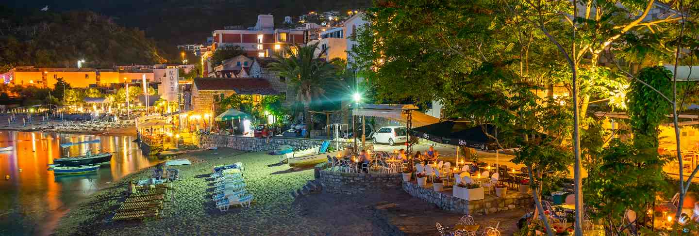 Tourists visited restaurants on the adriatic sea for a romantic dinner during sunset
