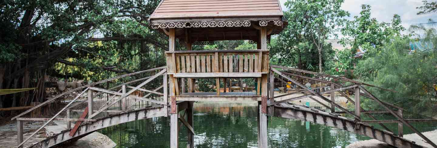 Wooden bridge across the river
