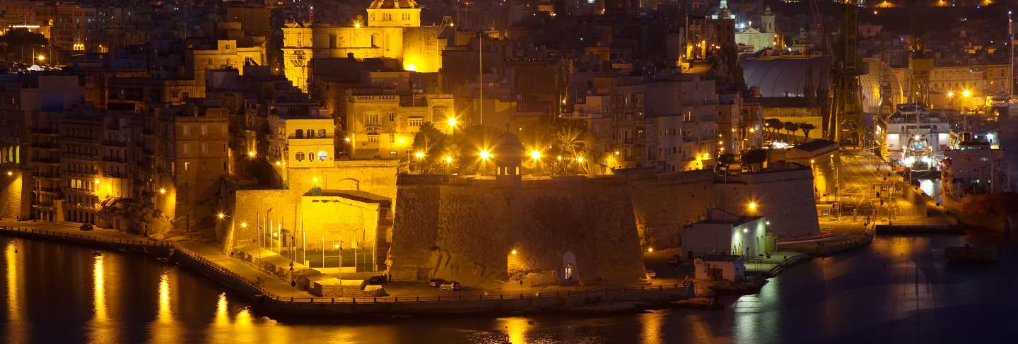 Night view of senglea from valetta Free Photo
