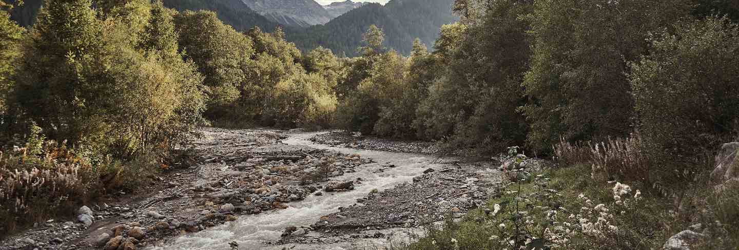 Horizontal shot of brook of St. Maria val müstair, engadin, Switzerland under the cloudy sky