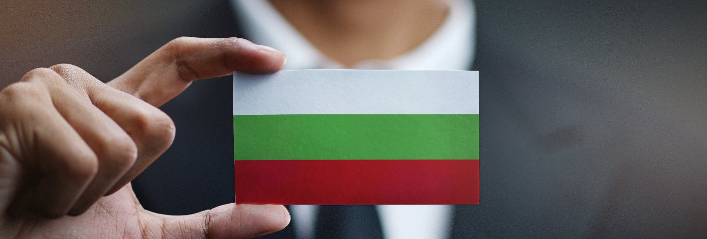 Businessman holding card of bulgaria flag
