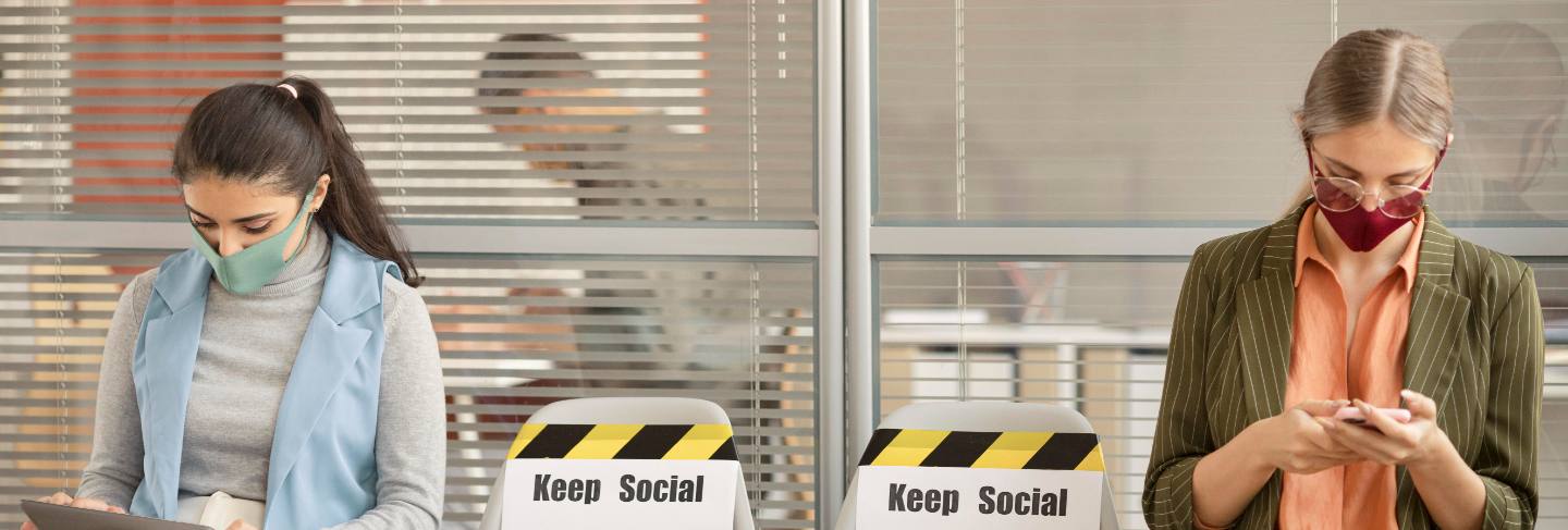 Employees respecting social distance at work
